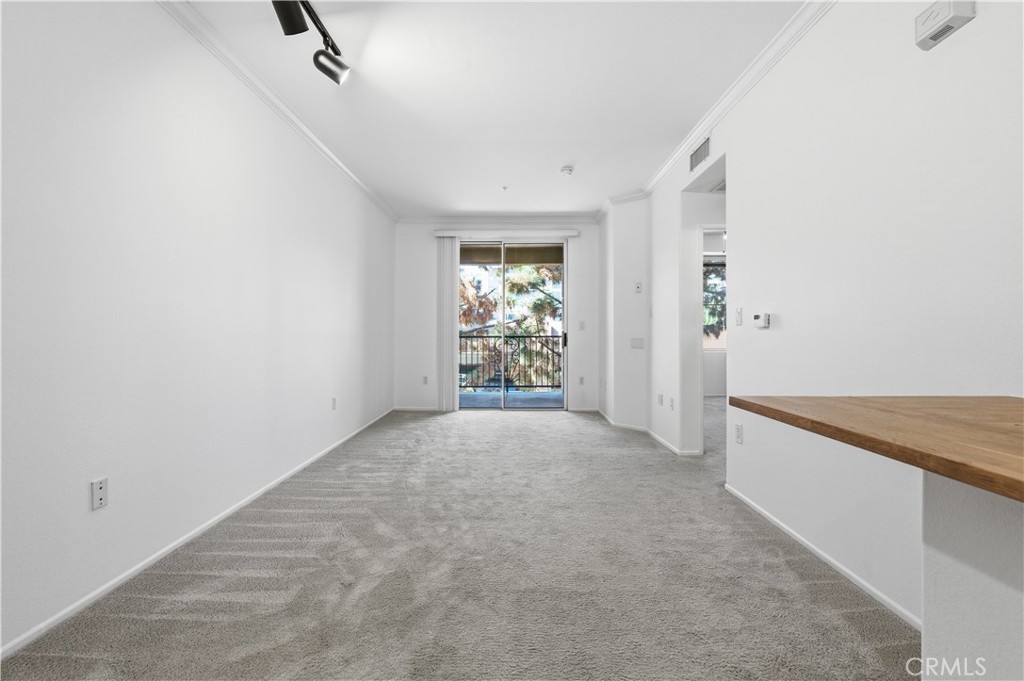 2311 Watermarke Place Irvine, CA 92612 - Photo 12 of 33 an empty room with windows