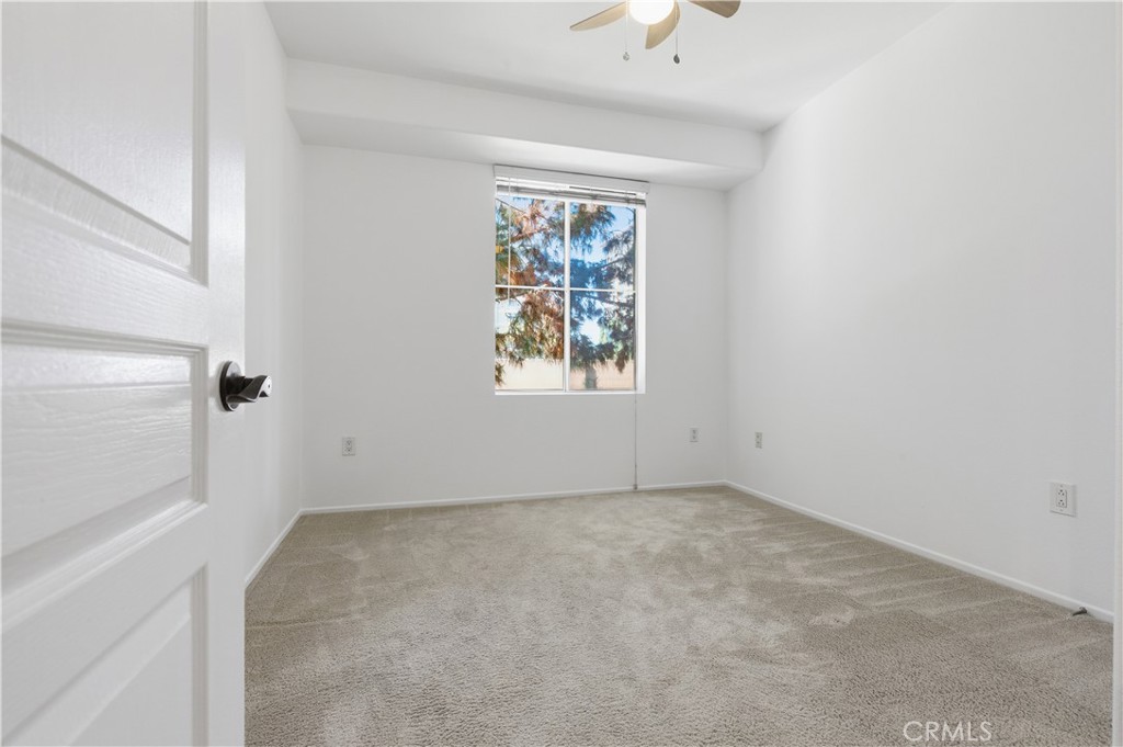 2311 Watermarke Place Irvine, CA 92612 - Photo 15 of 33 an empty room with windows