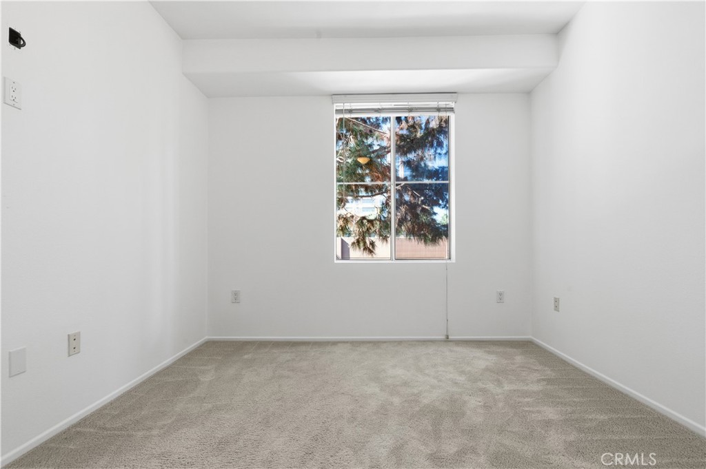 2311 Watermarke Place Irvine, CA 92612 - Photo 16 of 33 an empty room with a window