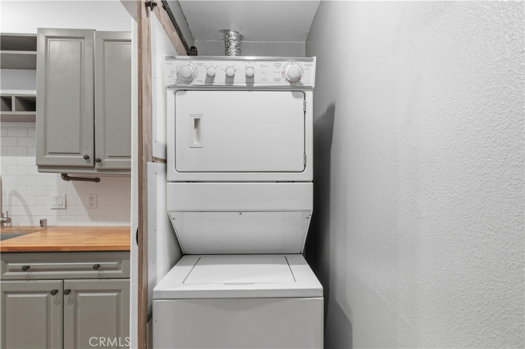 2311 Watermarke Place Irvine, CA 92612 - Photo 23 of 33 a utility room with dryer and washer