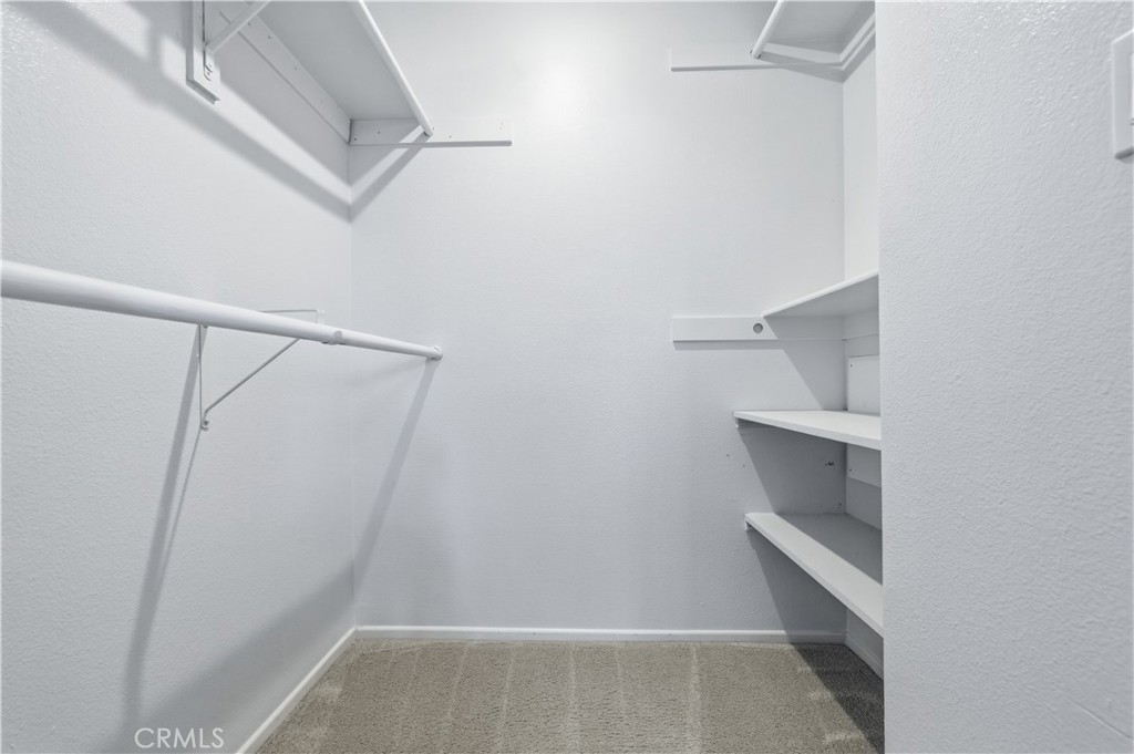 2311 Watermarke Place Irvine, CA 92612 - Photo 24 of 33 a room that has a door in it