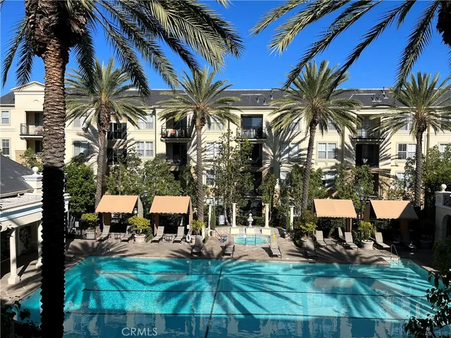 a view of a patio with table and chairs potted plants with wooden floor