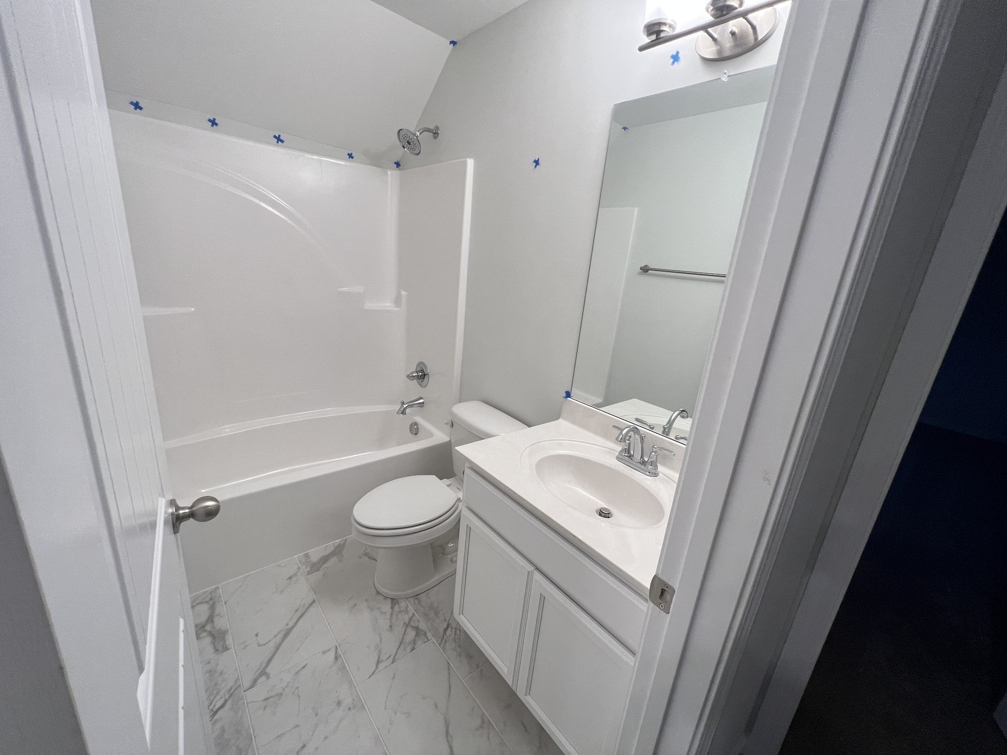 5620 Rooker Road Smyrna, TN 37167 - Photo 14 of 17 a bathroom with a sink a toilet and shower