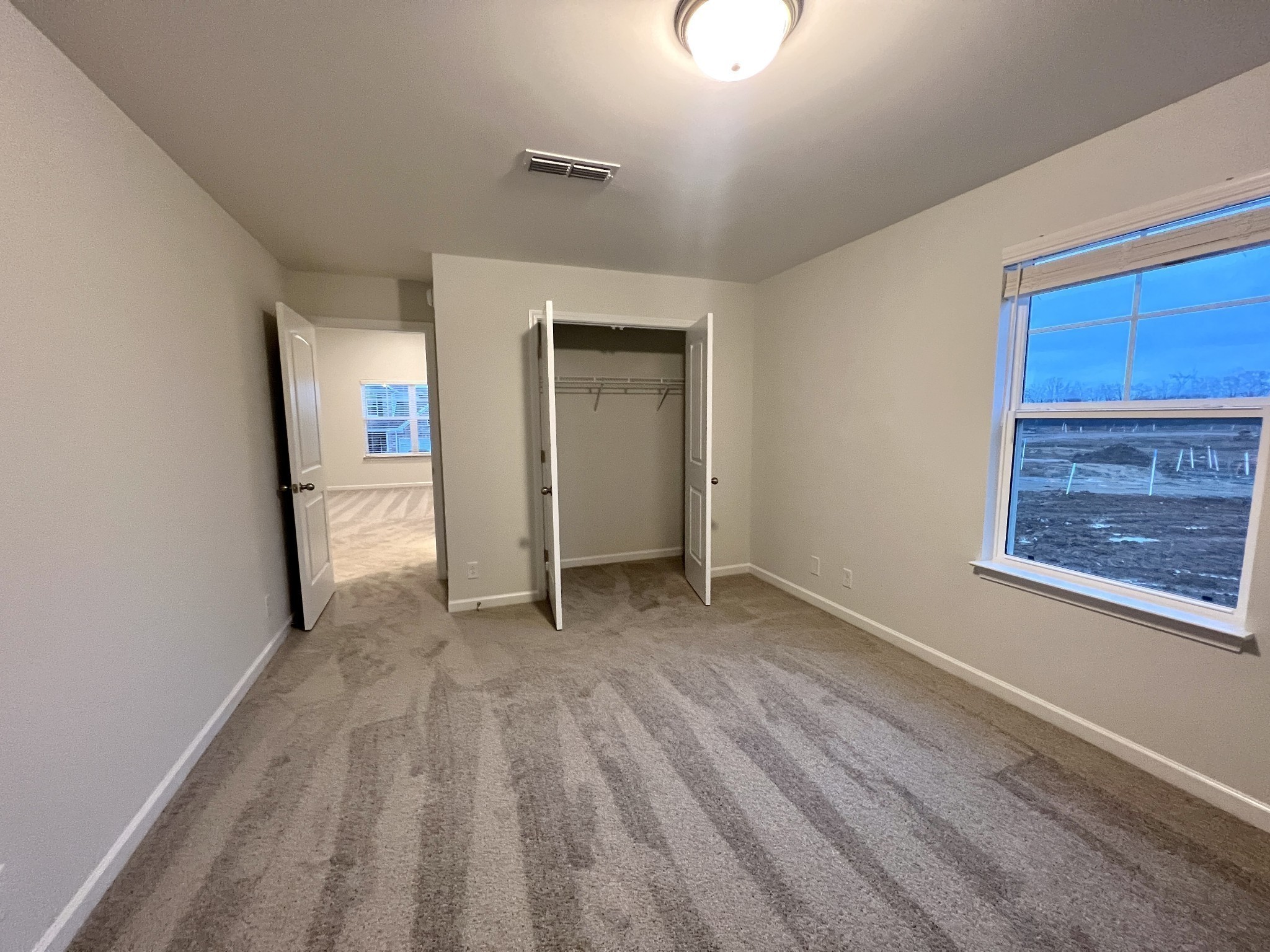 5620 Rooker Road Smyrna, TN 37167 - Photo 15 of 17 wooden floor in an empty room with a window