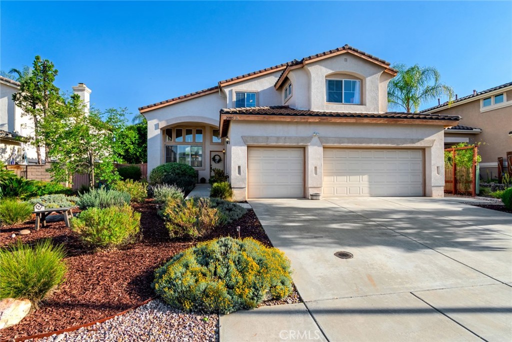 20885 Bakal Drive Riverside, CA 92508 - Photo 2 of 47 a front view of house with yard and green space