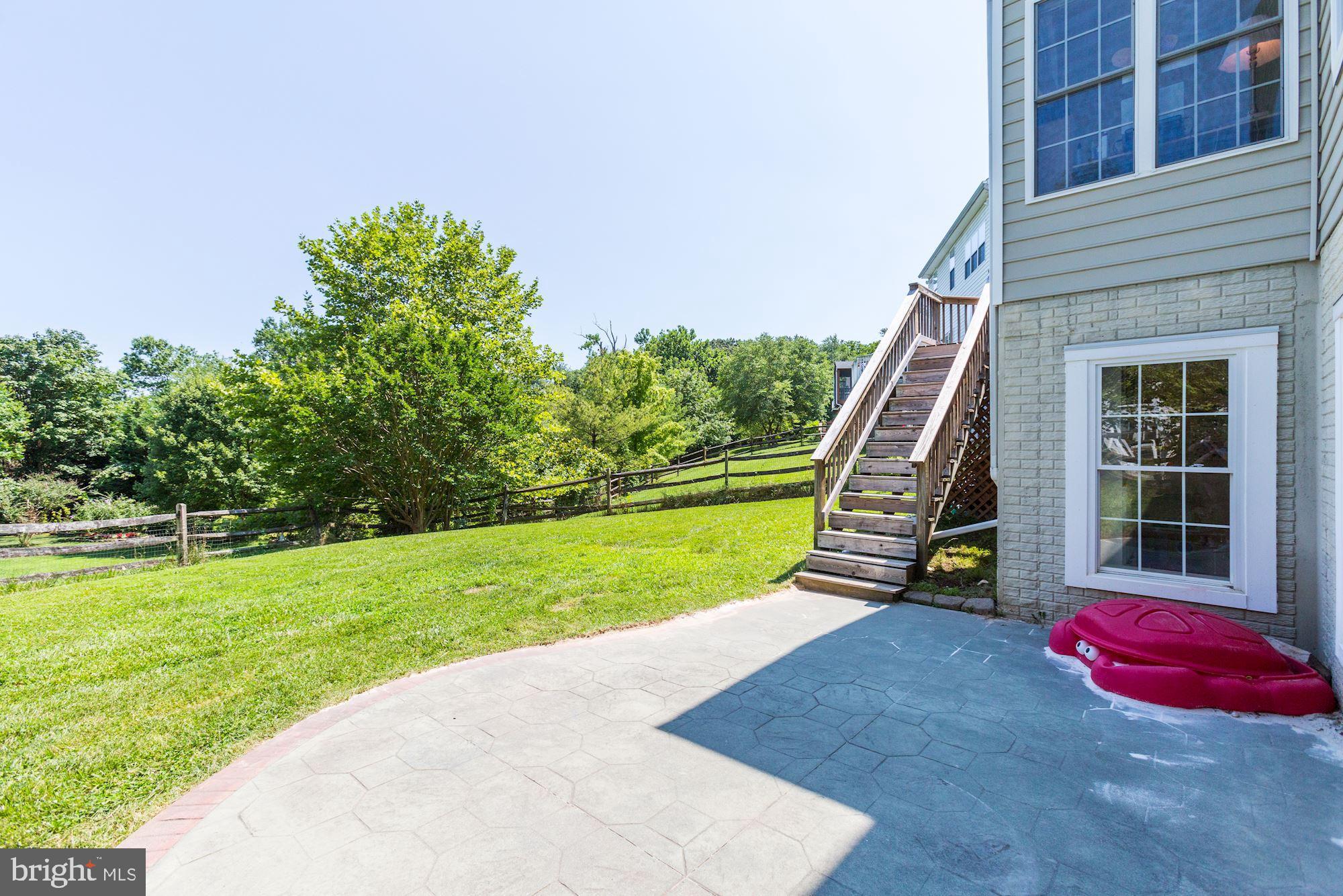 6017 Florey Road Hanover, MD 21076 - Photo 42 of 46 Stairs from Deck to Lower Level