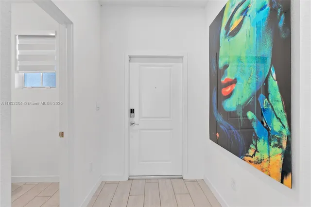 a bathroom with a sink vanity and toilet