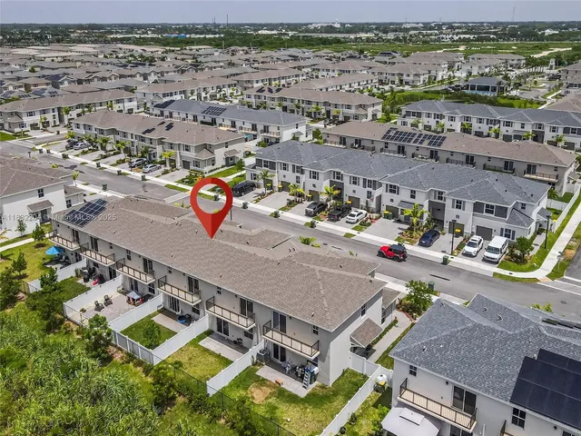 a view of a house with a ocean view