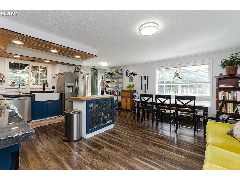 290 Southeast Palmblad Drive Gresham, OR 97080 - Photo 13 of 32 a living room with lots of furniture and kitchen view