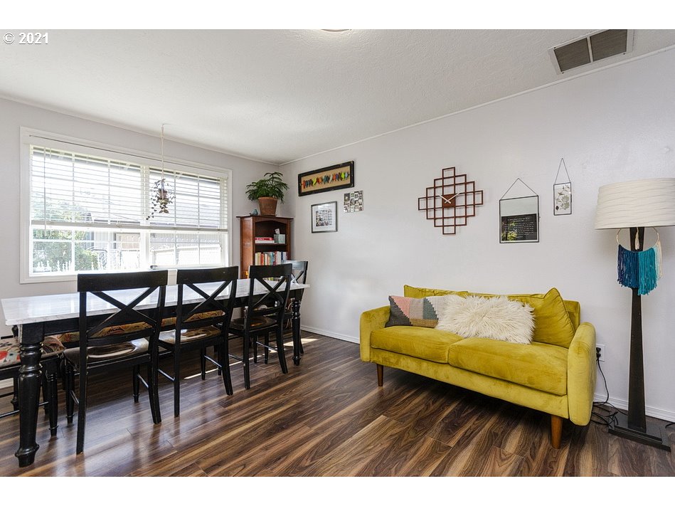 290 Southeast Palmblad Drive Gresham, OR 97080 - Photo 14 of 32 a living room with furniture and wooden floor