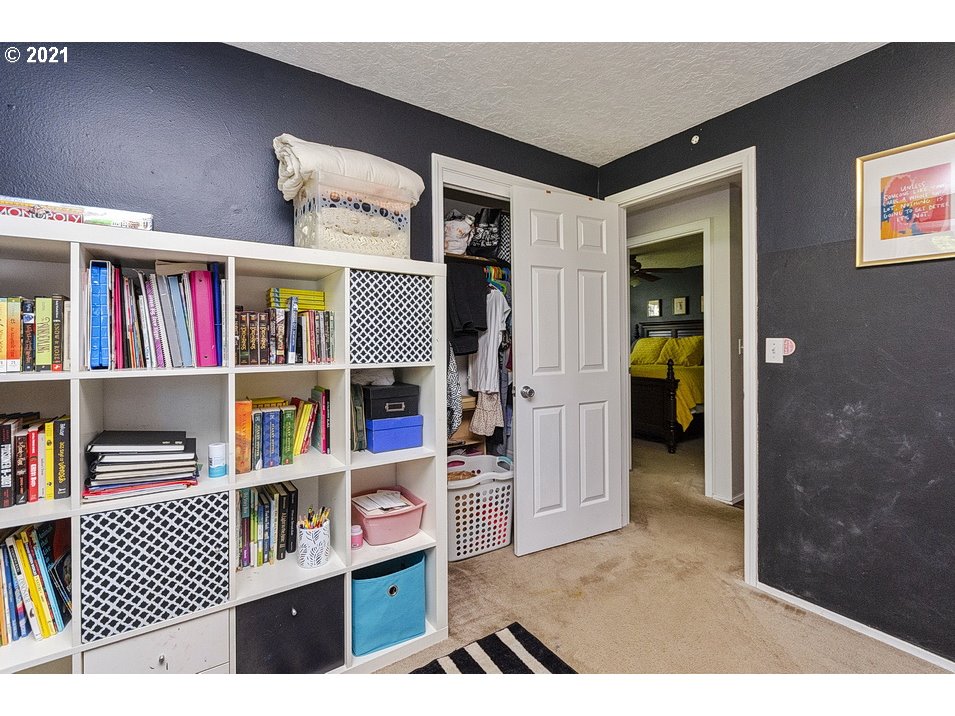 290 Southeast Palmblad Drive Gresham, OR 97080 - Photo 17 of 32 a bookshelf