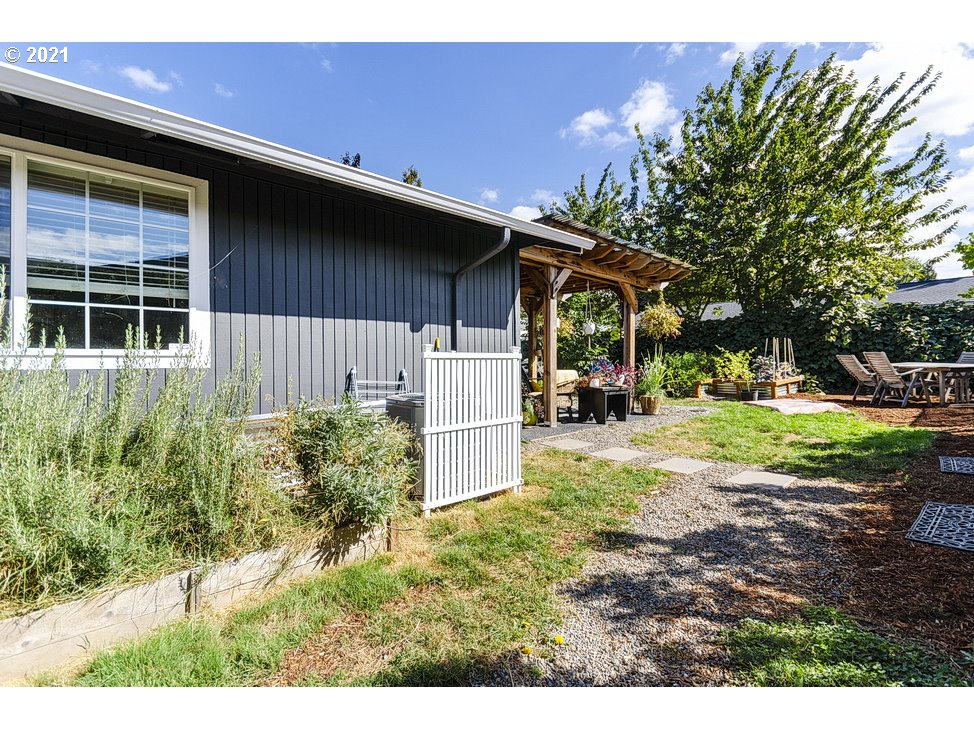 290 Southeast Palmblad Drive Gresham, OR 97080 - Photo 27 of 32 a view of a house with backyard and trees