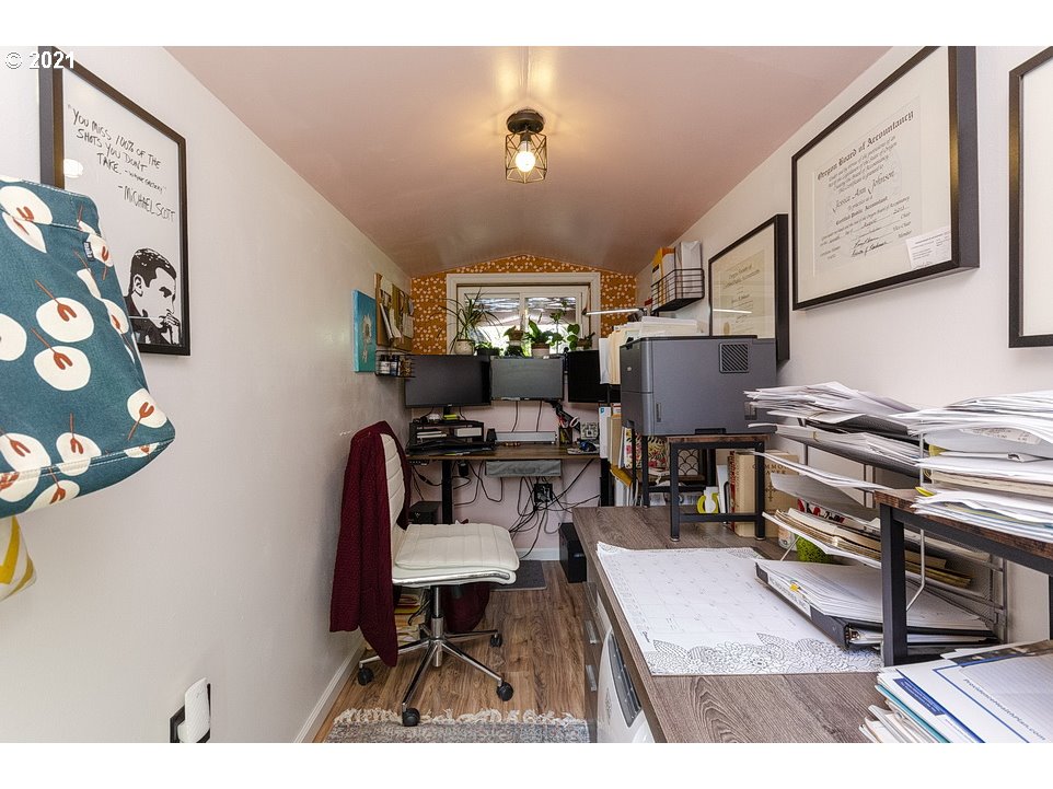 290 Southeast Palmblad Drive Gresham, OR 97080 - Photo 32 of 32 a living room with furniture a piano and a flat screen tv