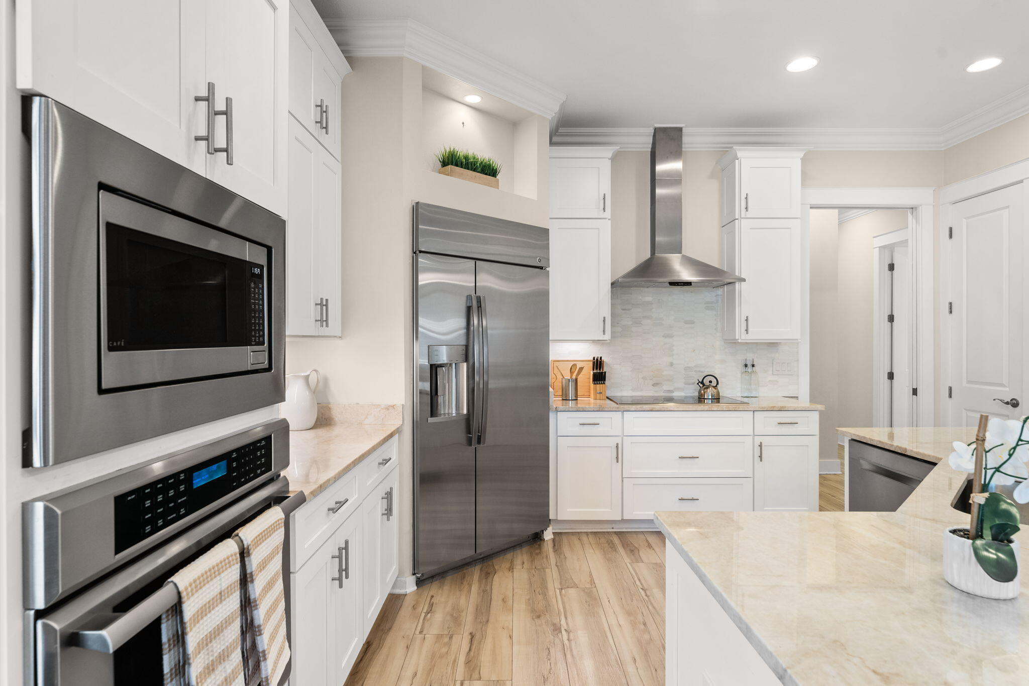 81 Botany Boulevard Santa Rosa Beach, FL 32459 - Photo 13 of 62 a kitchen with stainless steel appliances a refrigerator stove and sink