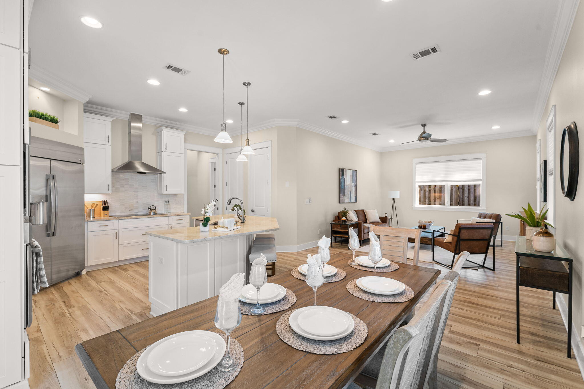 81 Botany Boulevard Santa Rosa Beach, FL 32459 - Photo 16 of 62 a large kitchen with a table and chairs