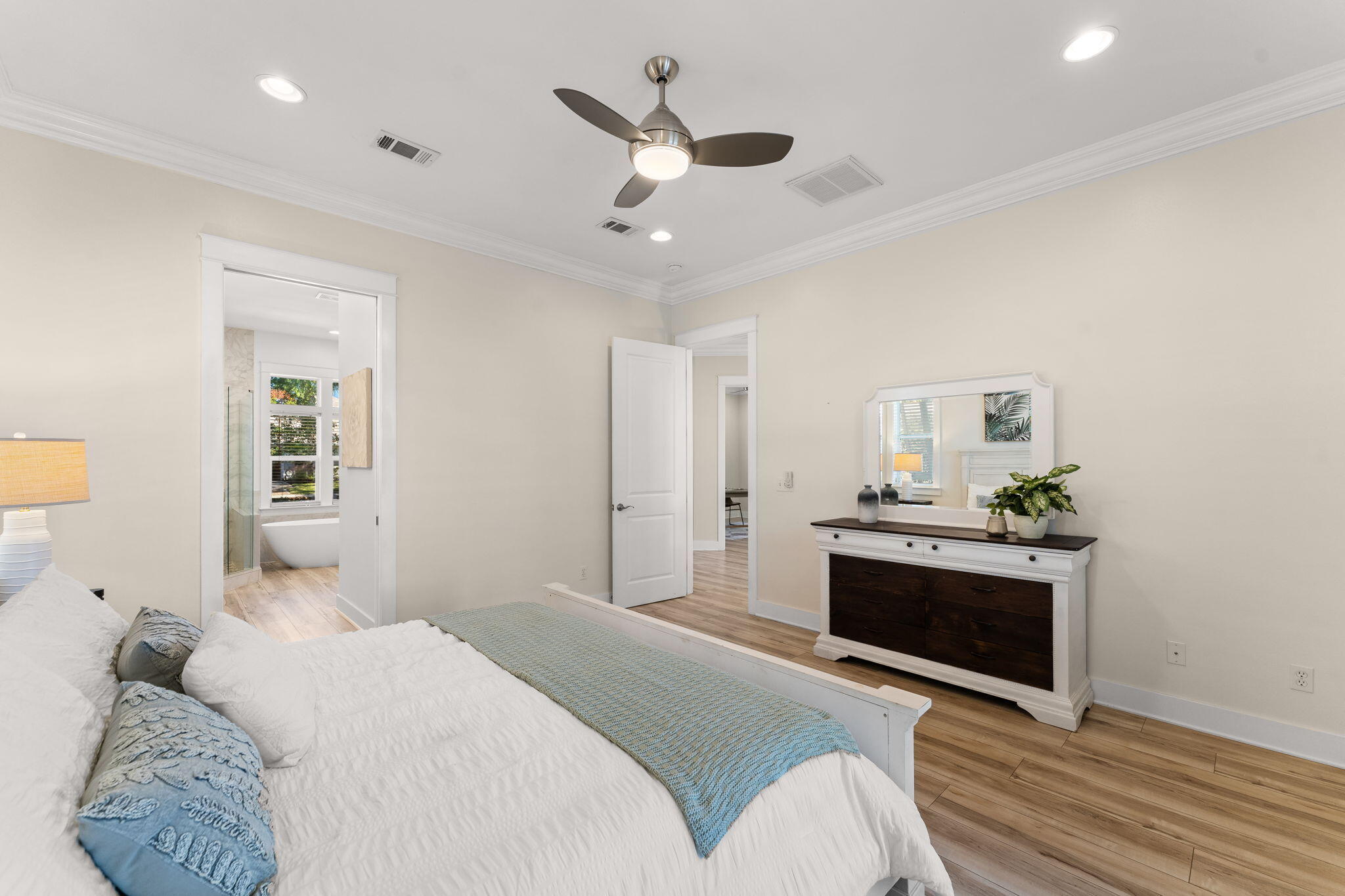 81 Botany Boulevard Santa Rosa Beach, FL 32459 - Photo 23 of 62 a bedroom with a bed and a fireplace