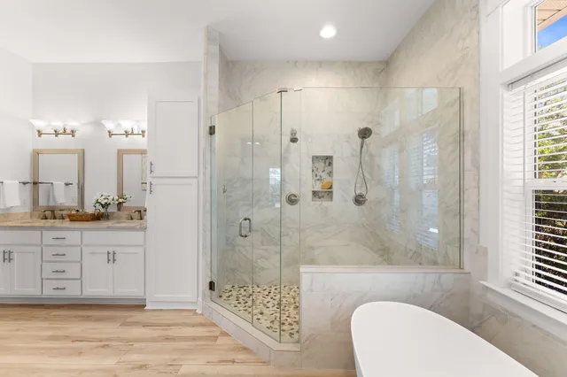 a bedroom with a bed and a walk in closet