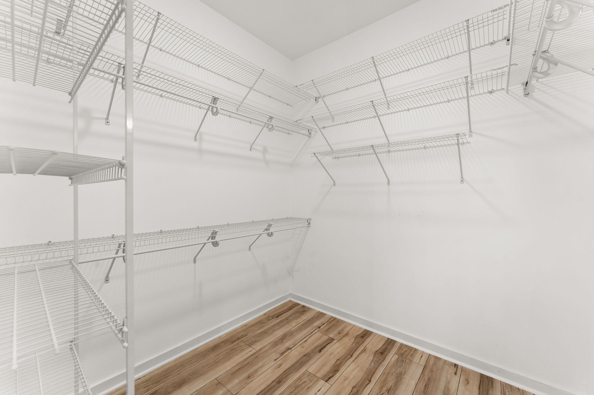 81 Botany Boulevard Santa Rosa Beach, FL 32459 - Photo 28 of 62 a view of a room with racks on the wall