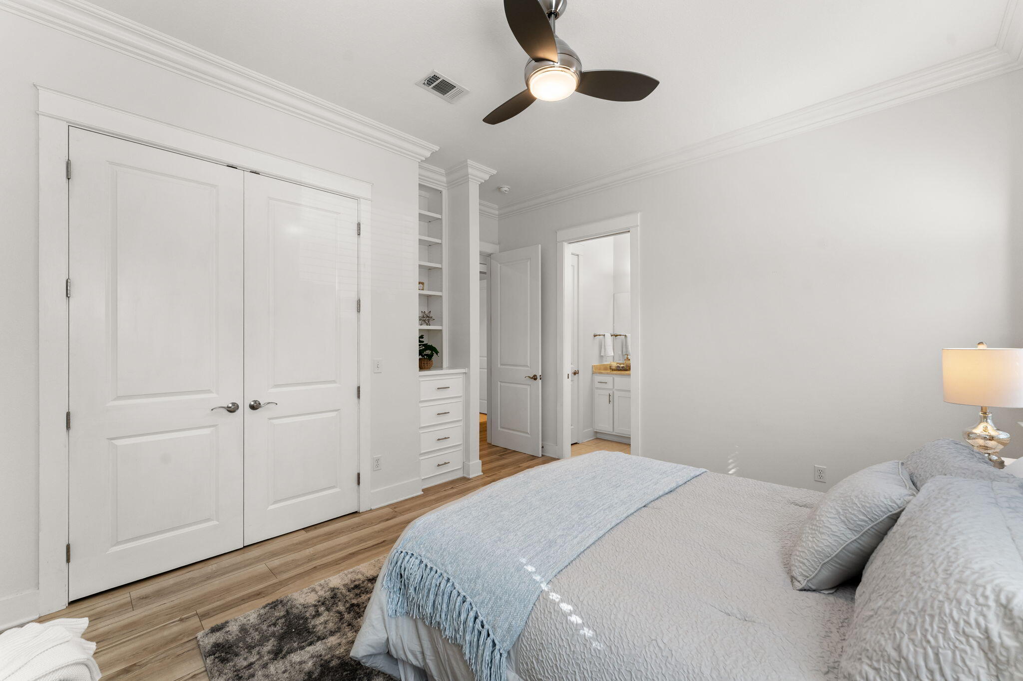 81 Botany Boulevard Santa Rosa Beach, FL 32459 - Photo 30 of 62 a bedroom with a bed and a walk in closet