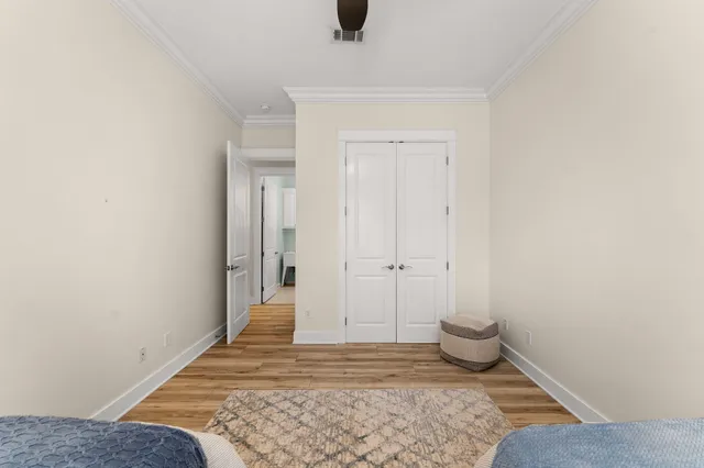 a view of a dining room with furniture water and a floor to ceiling window