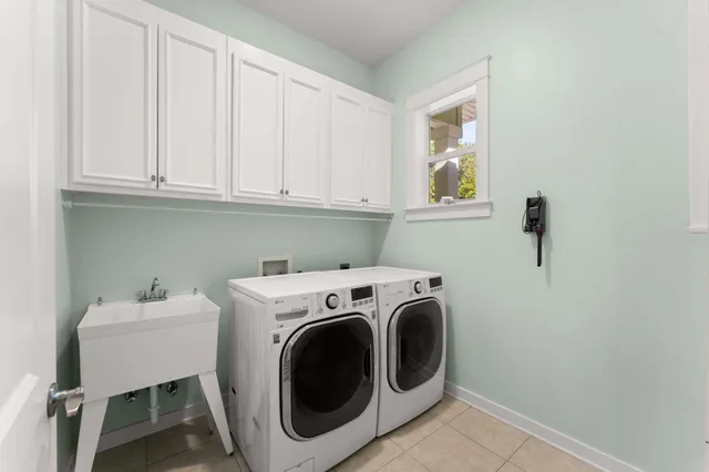 a kitchen with stainless steel appliances a refrigerator and cabinets