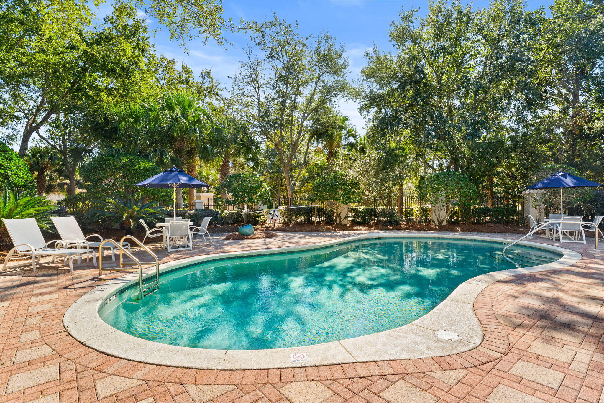 81 Botany Boulevard Santa Rosa Beach, FL 32459 - Photo 60 of 62 a view of a swimming pool with a patio