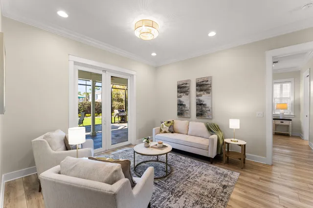 a living room with furniture and a window