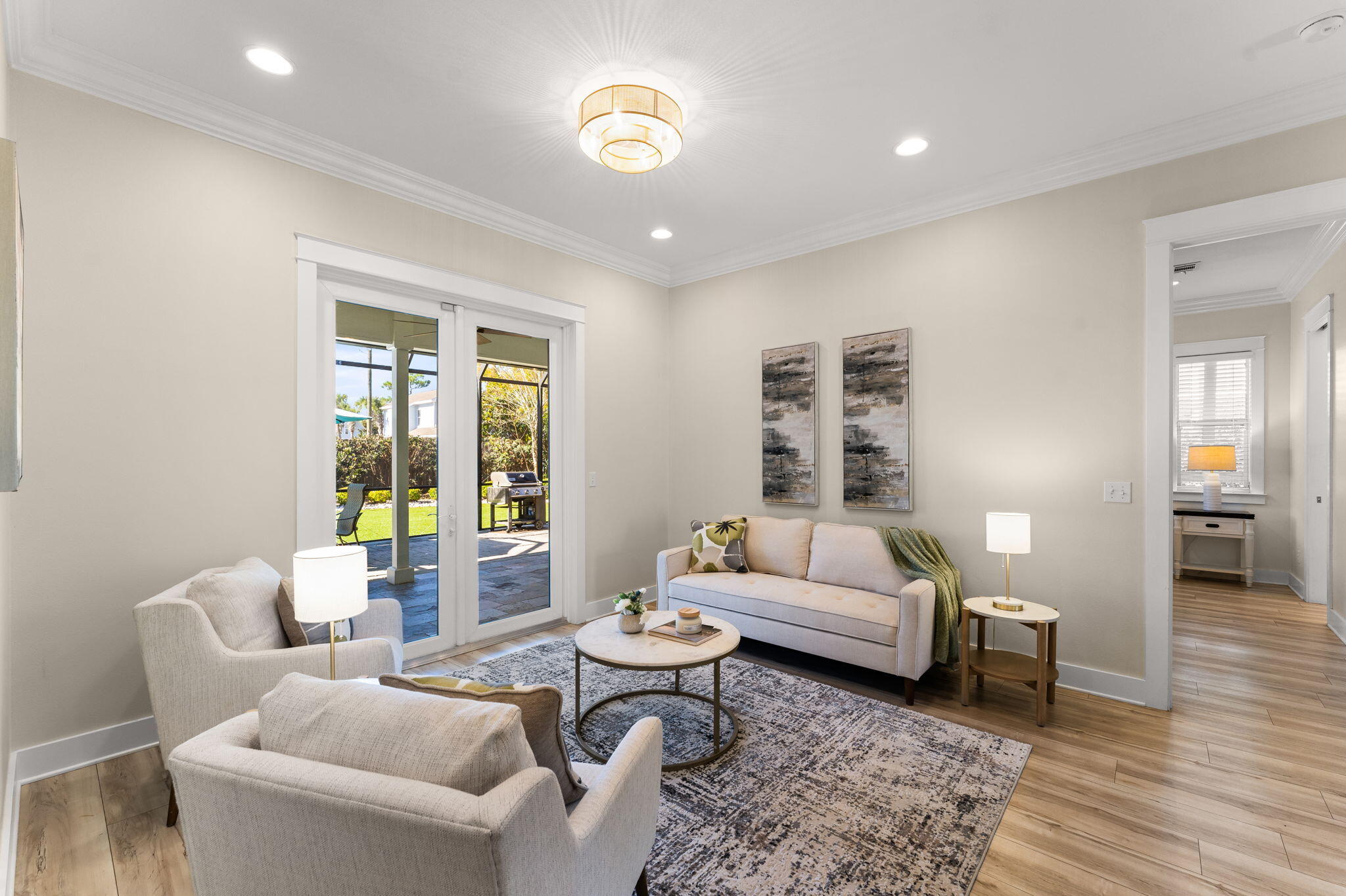 81 Botany Boulevard Santa Rosa Beach, FL 32459 - Photo 6 of 62 a living room with furniture and wooden floor