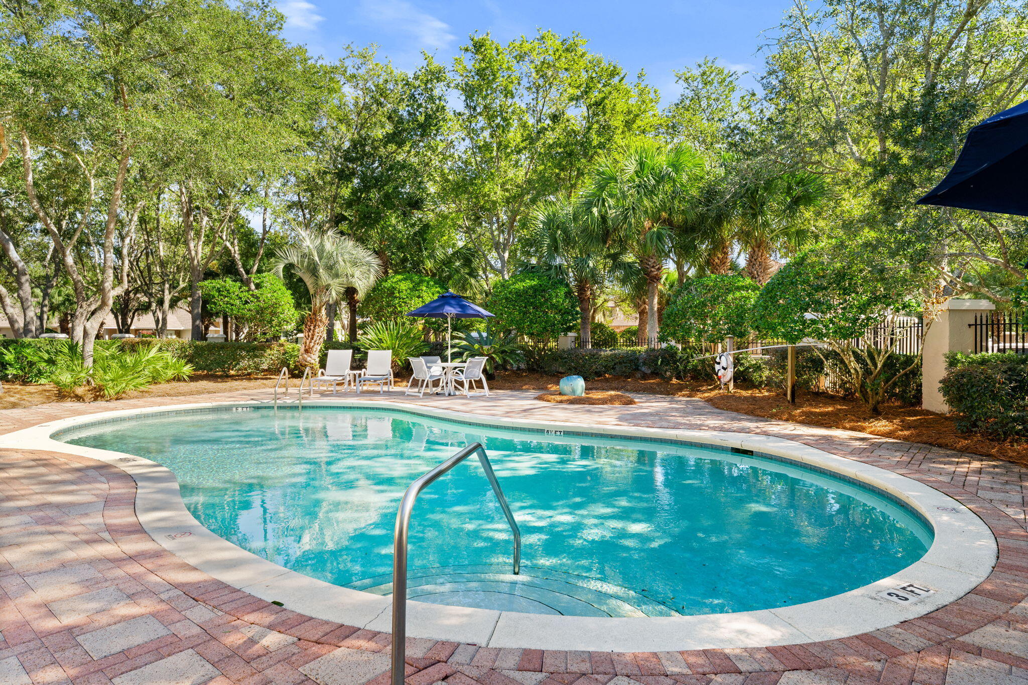 81 Botany Boulevard Santa Rosa Beach, FL 32459 - Photo 61 of 62 a view of a swimming pool with a patio