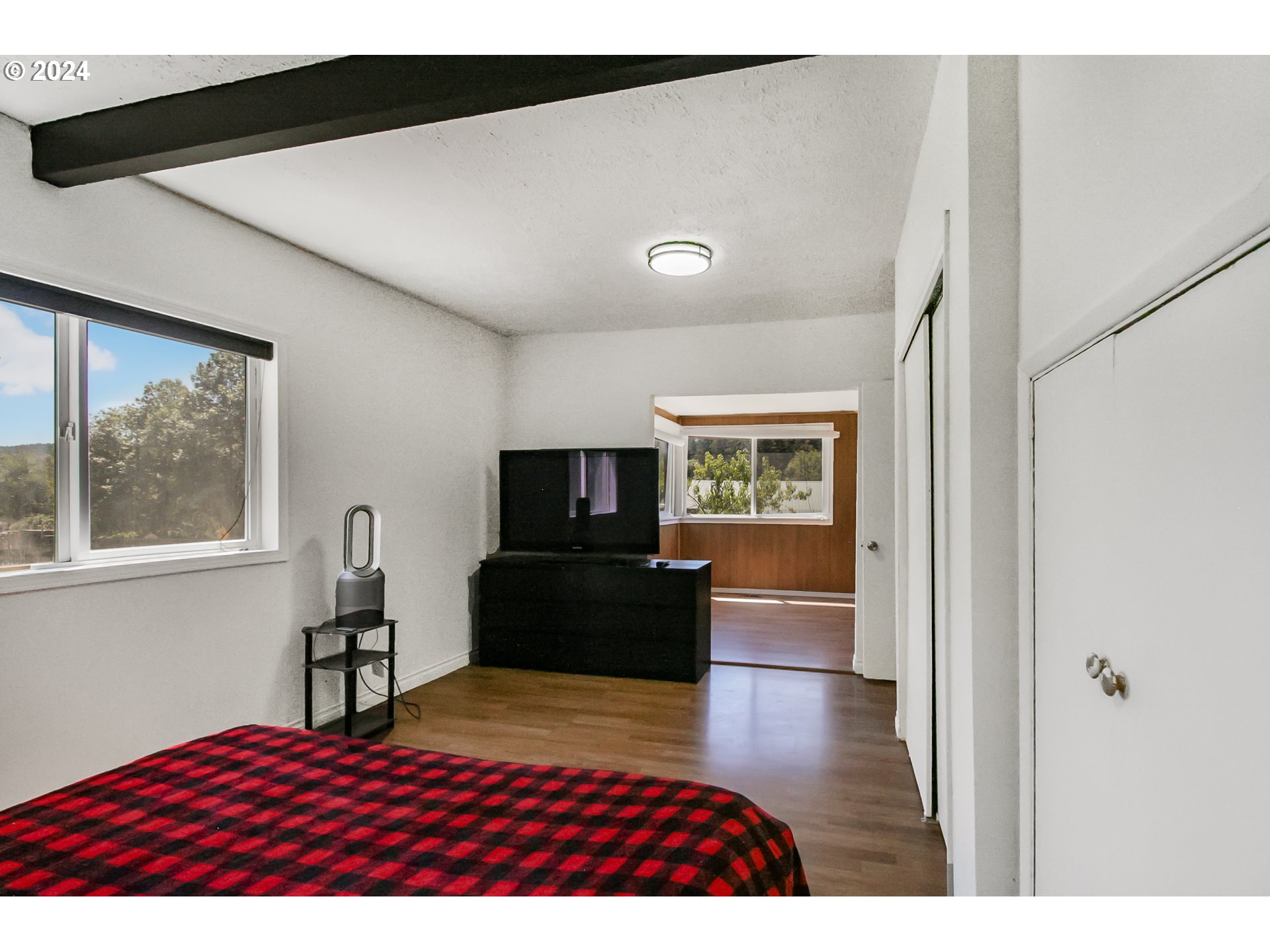 20239 Northwest Pihl Road Banks, OR 97106 - Photo 12 of 35 a living room with furniture and a flat screen tv