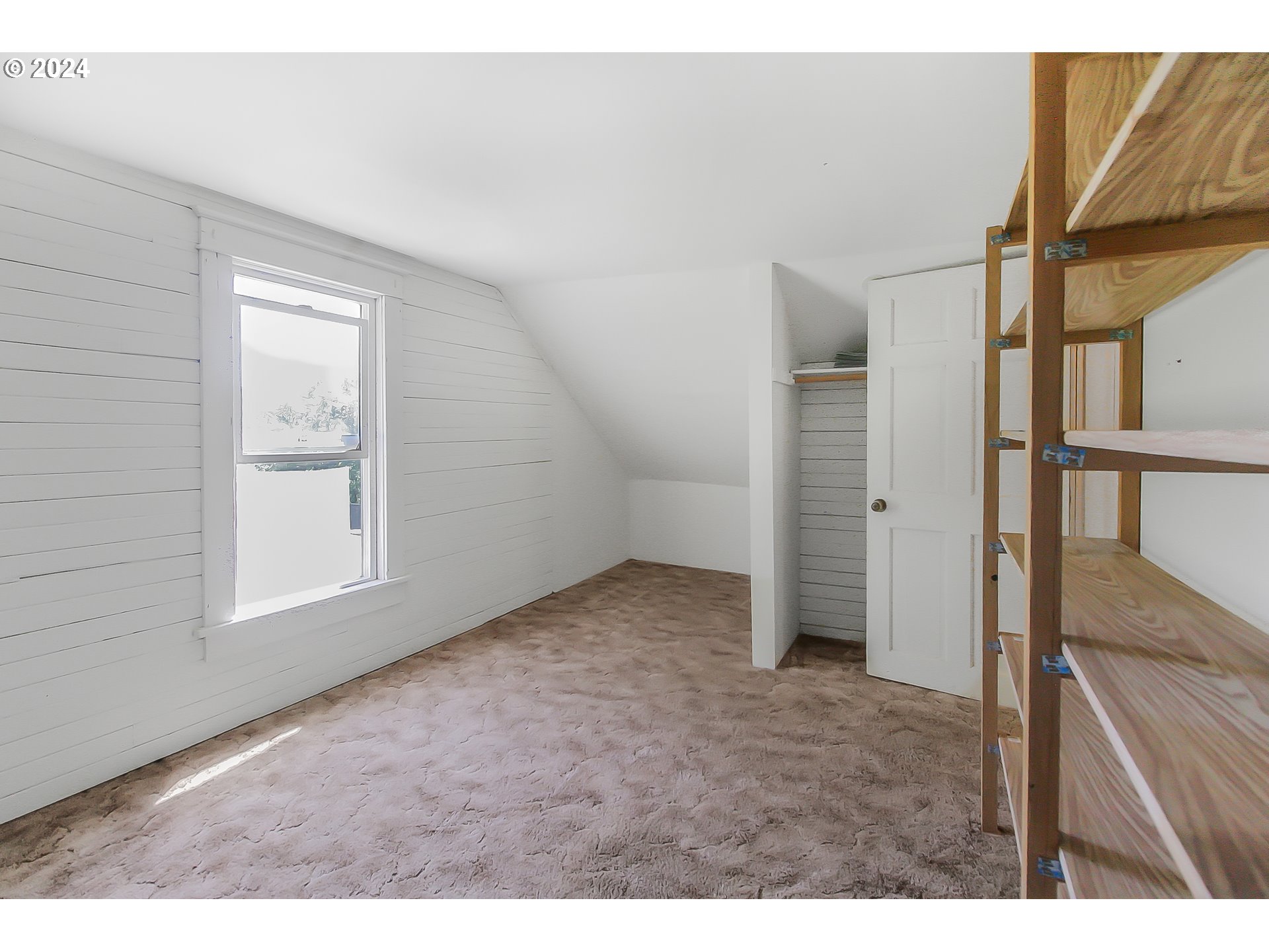 20239 Northwest Pihl Road Banks, OR 97106 - Photo 17 of 35 a view of an empty room with a window
