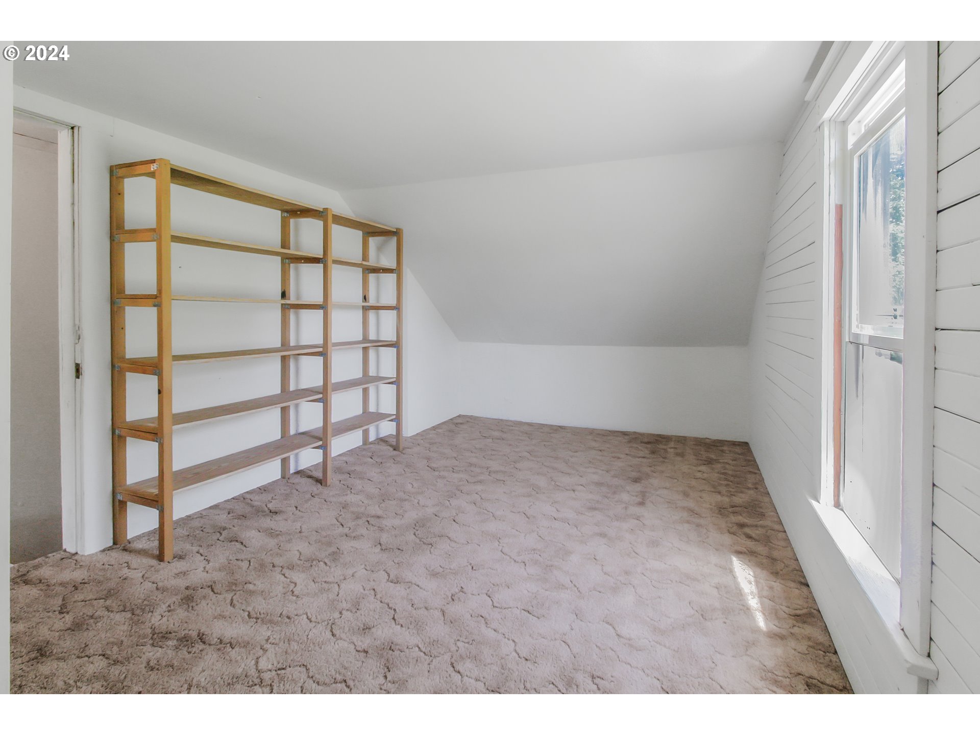 20239 Northwest Pihl Road Banks, OR 97106 - Photo 18 of 35 a view of an empty room and a window