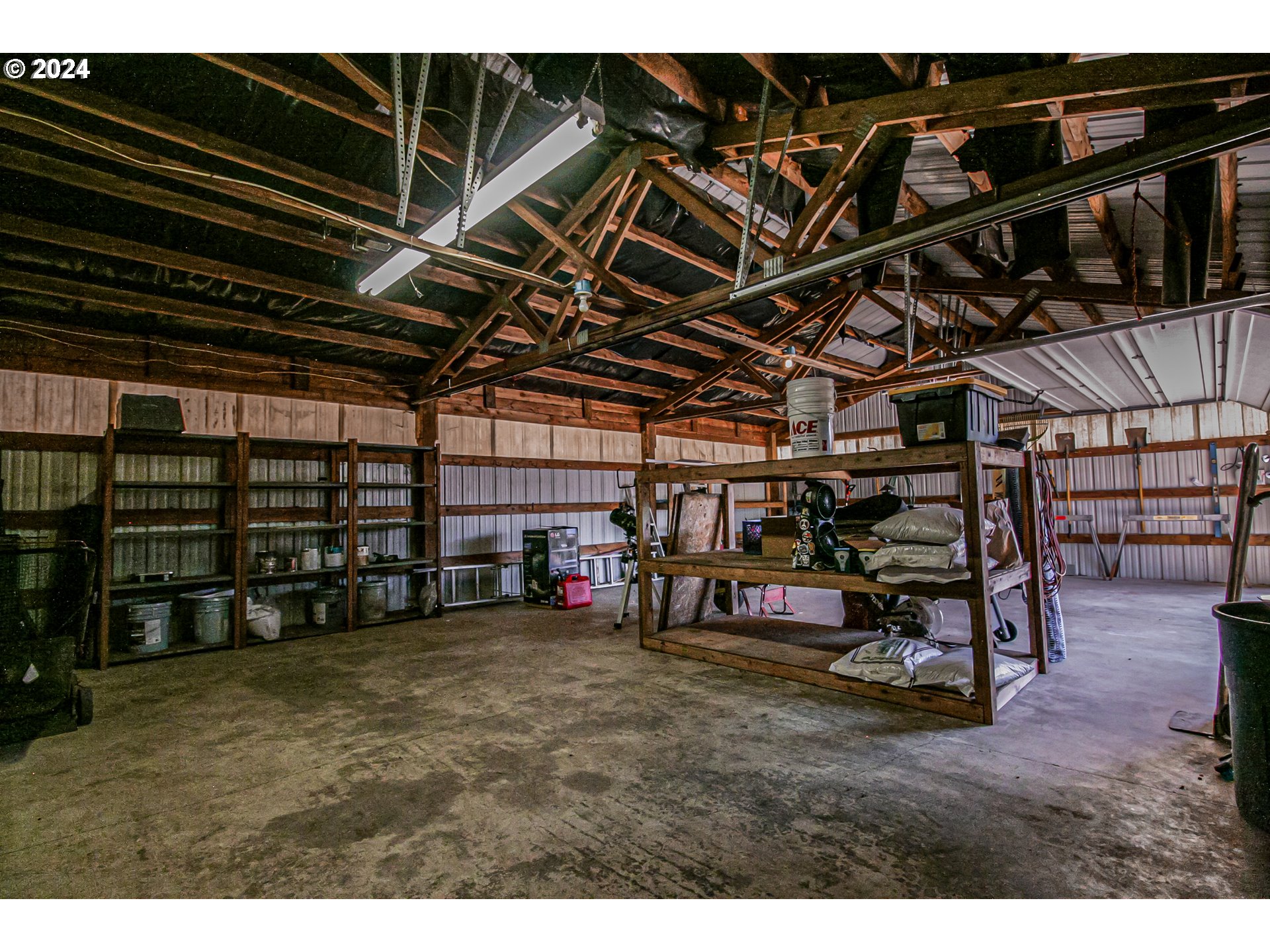 20239 Northwest Pihl Road Banks, OR 97106 - Photo 25 of 35 a view of an empty room with wooden ceiling
