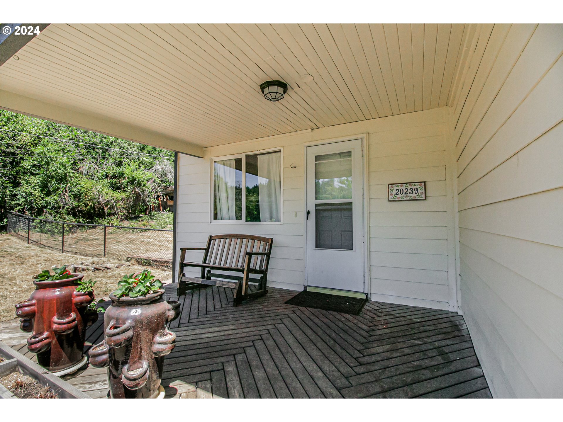 20239 Northwest Pihl Road Banks, OR 97106 - Photo 5 of 35 a view of a patio with wooden floor