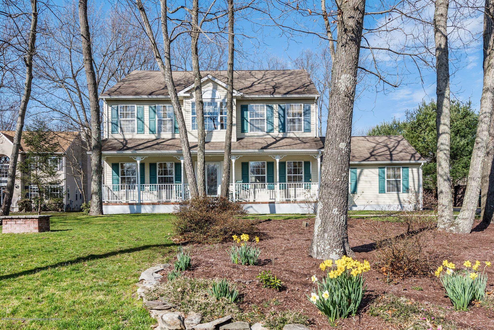 934 Hyson Road Jackson, NJ 08527 - Photo 1 of 43 a front view of a house with garden