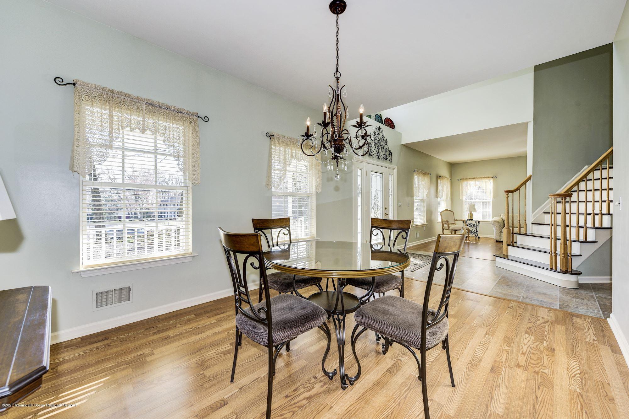 934 Hyson Road Jackson, NJ 08527 - Photo 12 of 43 a view of a dining room with furniture and wooden floor
