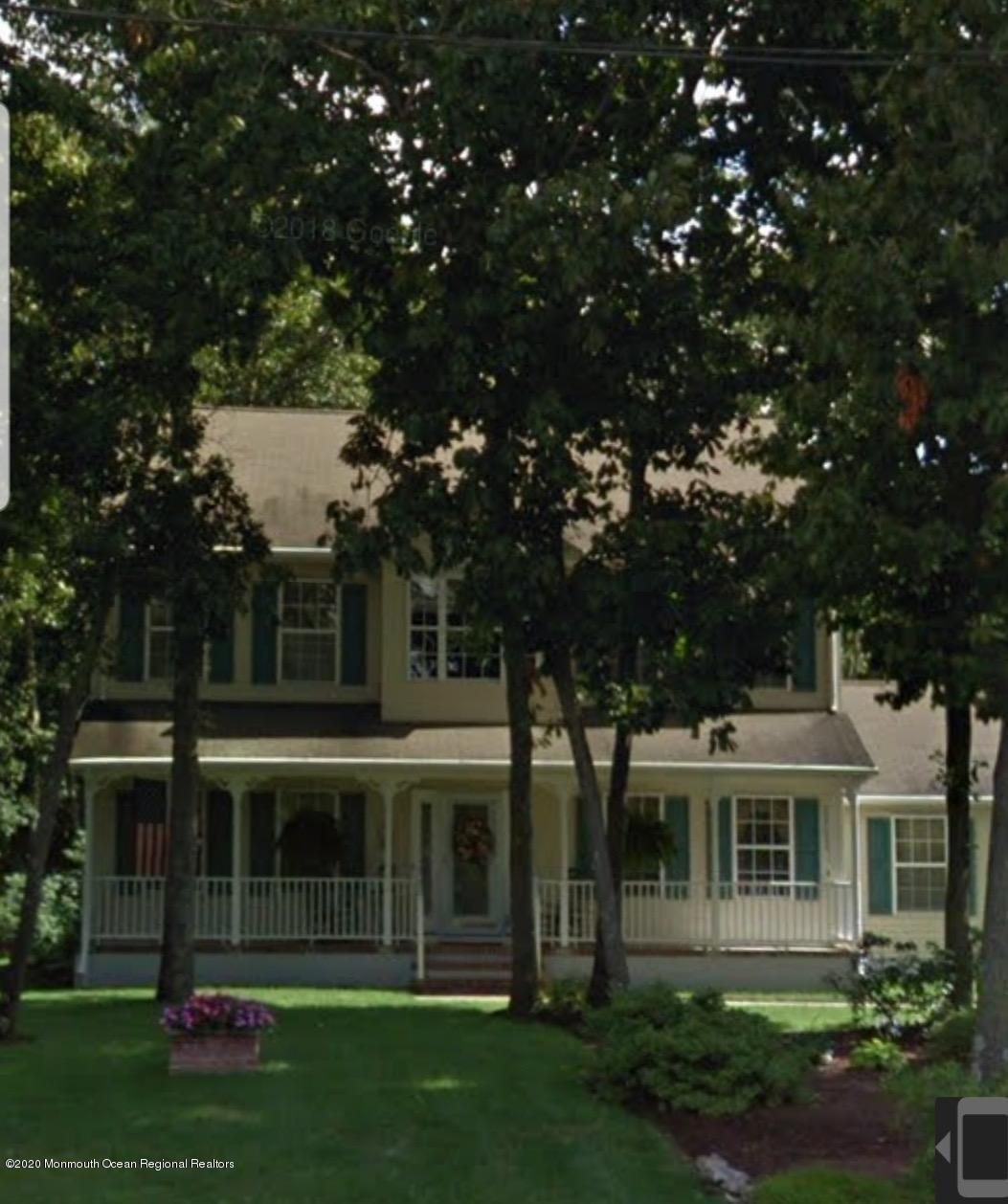 934 Hyson Road Jackson, NJ 08527 - Photo 6 of 43 front view of a house with a yard