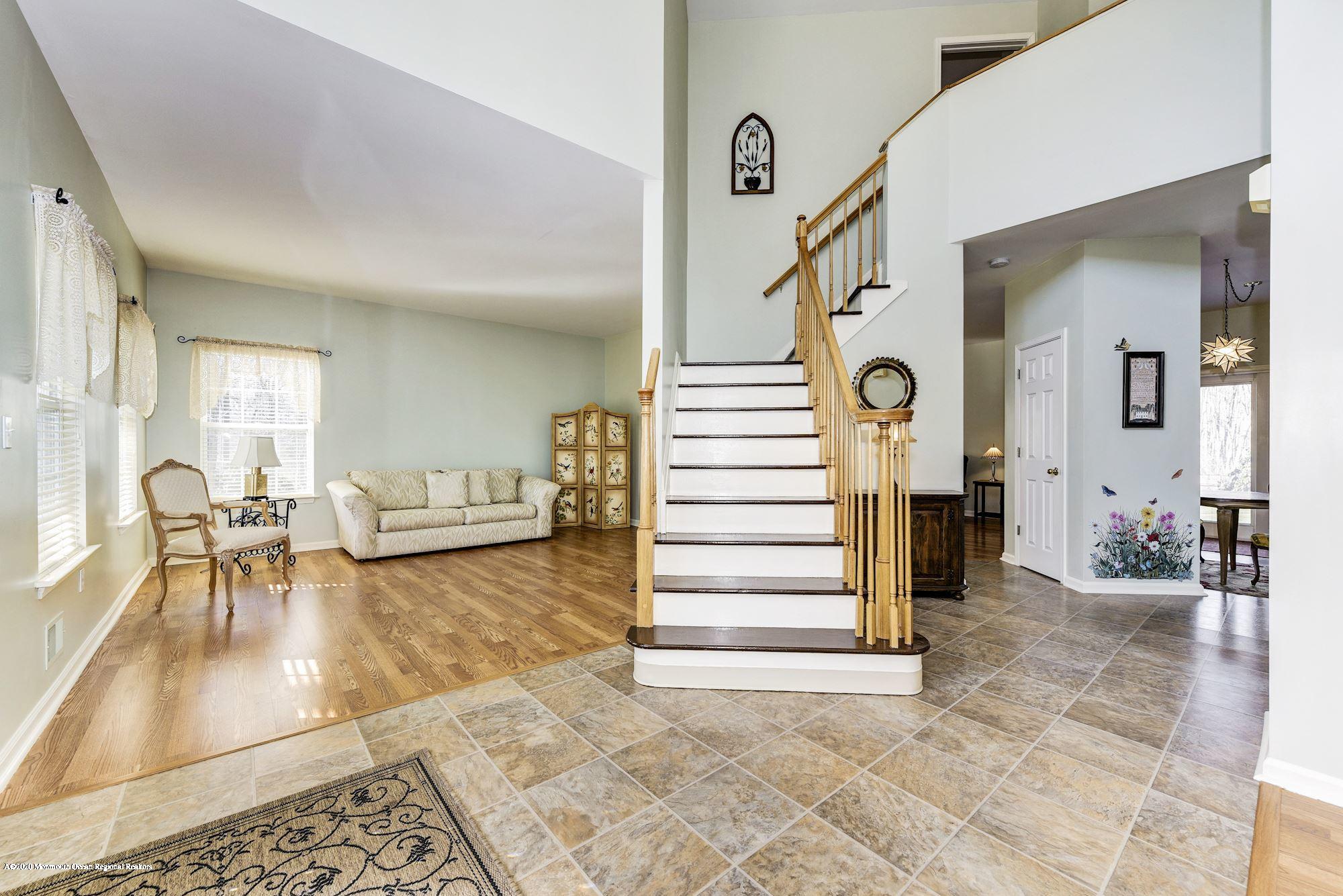 934 Hyson Road Jackson, NJ 08527 - Photo 8 of 43 a view of a livingroom with furniture and stairs