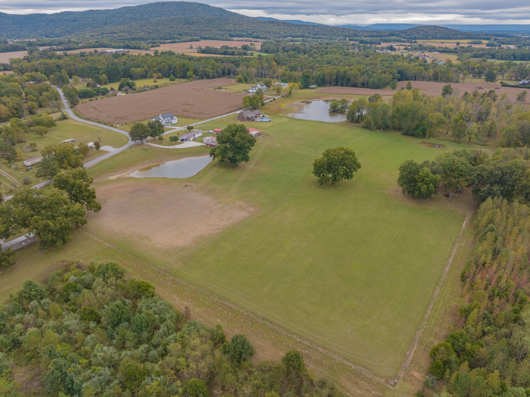 0 Roy E Bryan Road Hillsboro, TN 37342 - Photo 1 of 13 an aerial view of residential houses with outdoor space