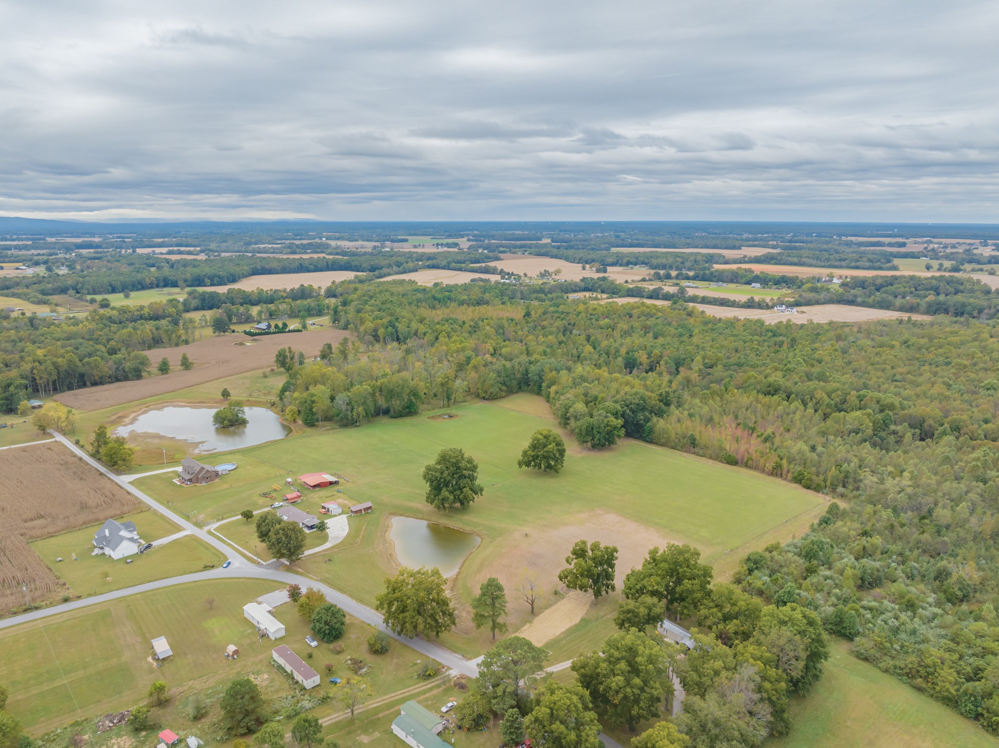 0 Roy E Bryan Road Hillsboro, TN 37342 - Photo 11 of 13 a view of a lake with a yard