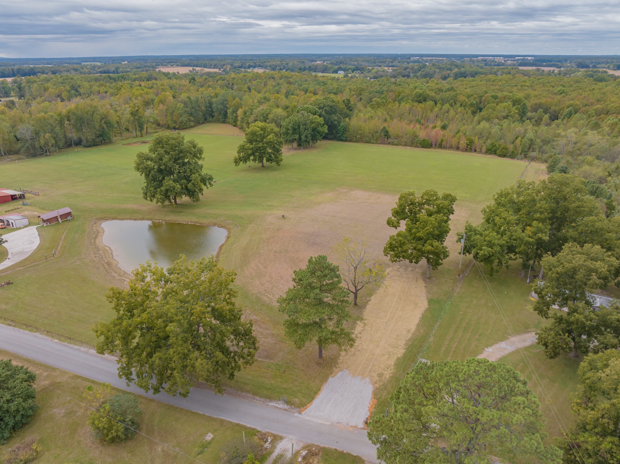 0 Roy E Bryan Road Hillsboro, TN 37342 - Photo 5 of 13 a view of a lake with a mountain in the background