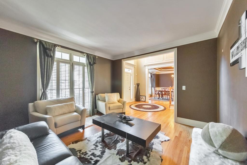 3161 Willowstone Drive Duluth, GA 30096 - Photo 11 of 72 a living room with furniture and a large window