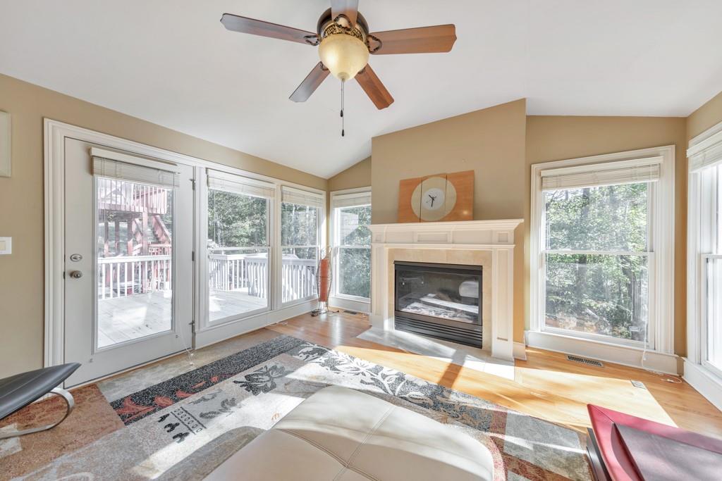 3161 Willowstone Drive Duluth, GA 30096 - Photo 20 of 72 a bedroom with a bed and a fireplace