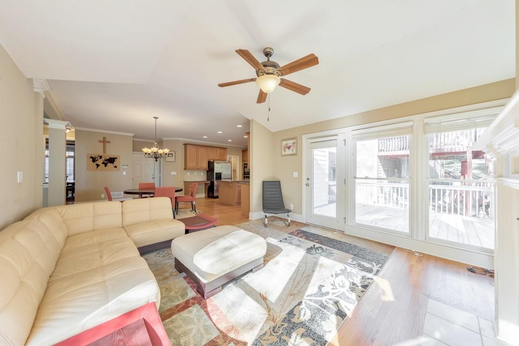 3161 Willowstone Drive Duluth, GA 30096 - Photo 21 of 72 a living room with furniture and a large window