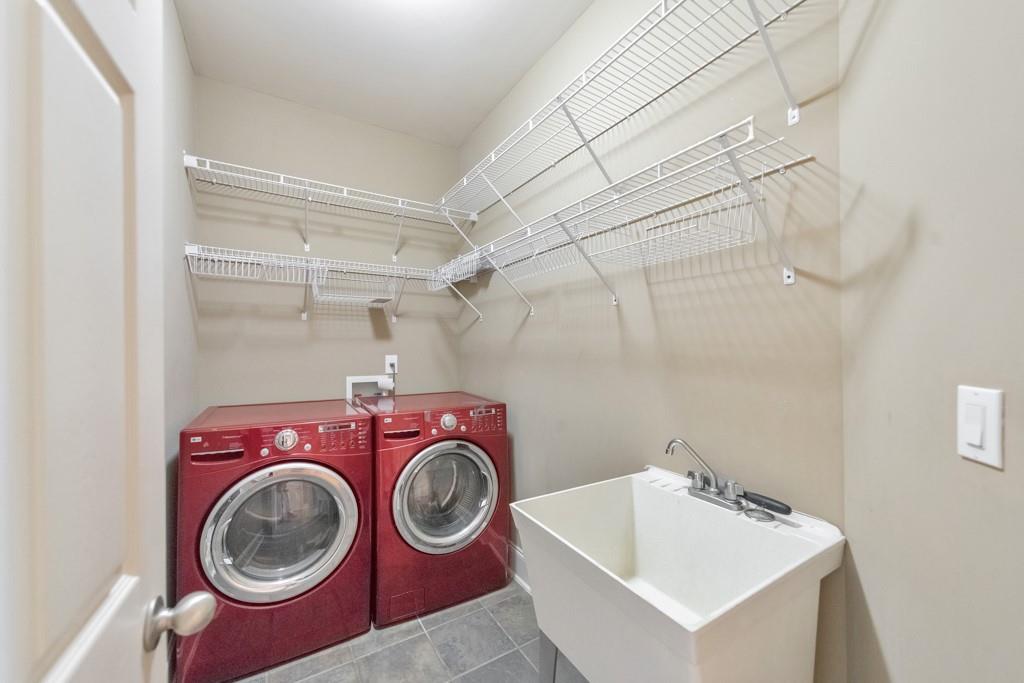 3161 Willowstone Drive Duluth, GA 30096 - Photo 25 of 72 a utility room with dryer and washer