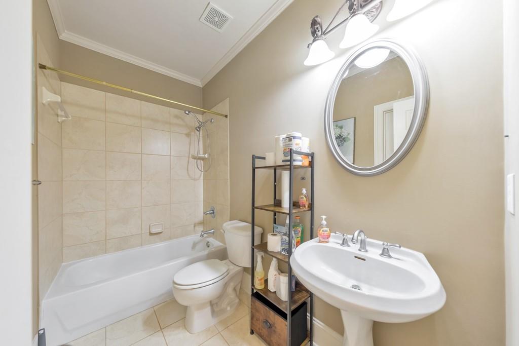 3161 Willowstone Drive Duluth, GA 30096 - Photo 28 of 72 a bathroom with a sink a toilet and shower