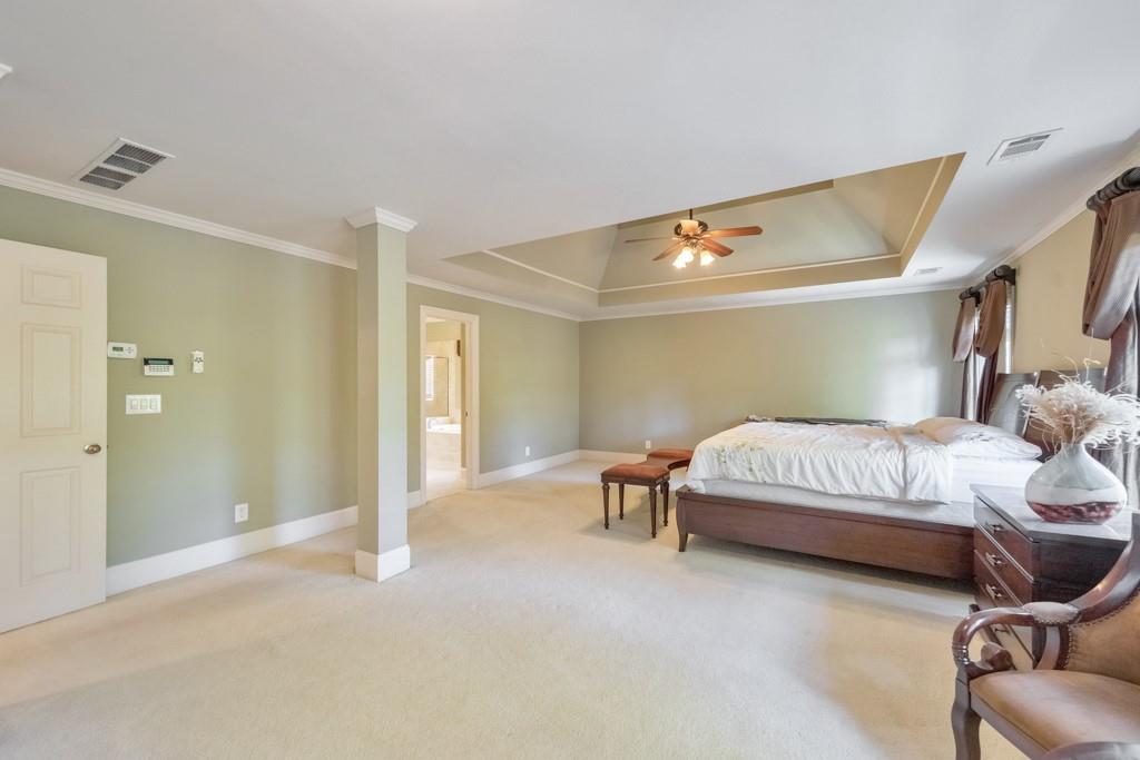 3161 Willowstone Drive Duluth, GA 30096 - Photo 31 of 72 a bedroom with furniture and a air conditioner vent