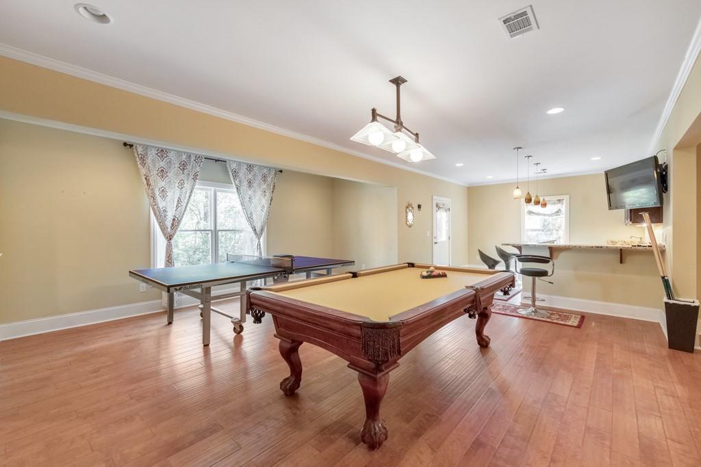3161 Willowstone Drive Duluth, GA 30096 - Photo 45 of 72 a room with furniture pool table and wooden floor