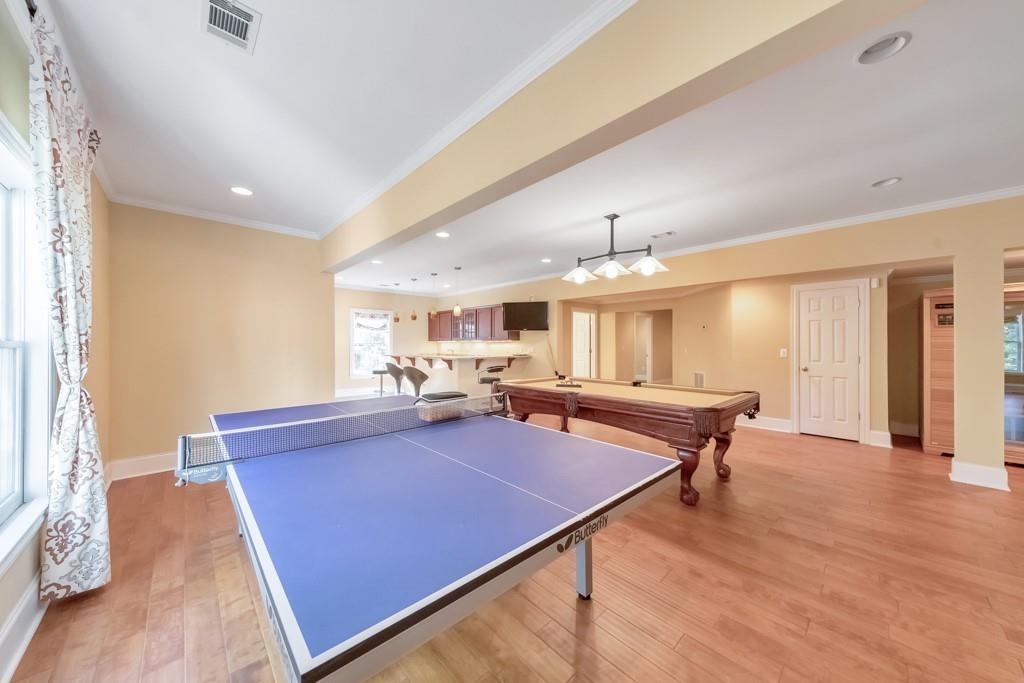 3161 Willowstone Drive Duluth, GA 30096 - Photo 46 of 72 a room with pool table and windows