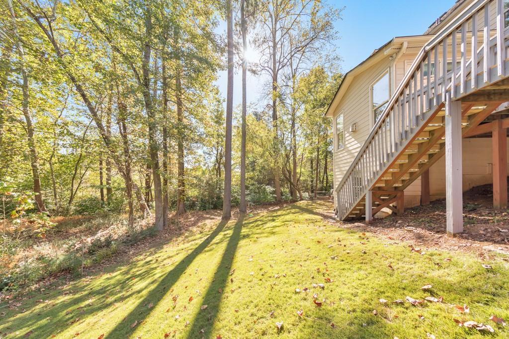 3161 Willowstone Drive Duluth, GA 30096 - Photo 60 of 72 a view of a pathway with a yard